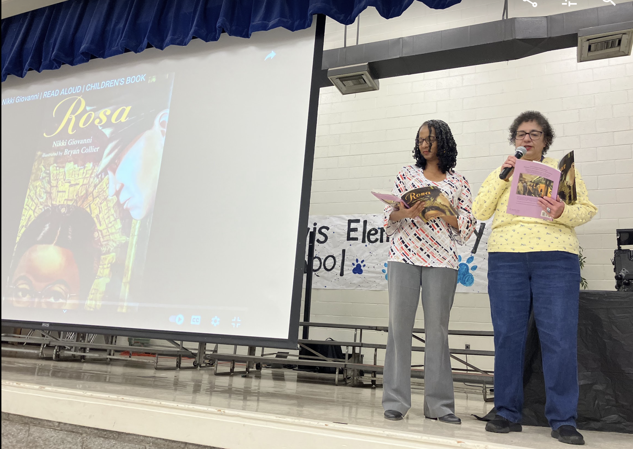 Dr. Feracho and Dr. Medine reading at Whit Davis Elementary, Feb. 2024